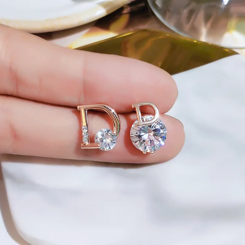 

2022 New Simple Inlaid Zircon Letter D Earrings 925 Silver Needle Asymmetric Earrings Small Earrings for Women Gift Wholesale