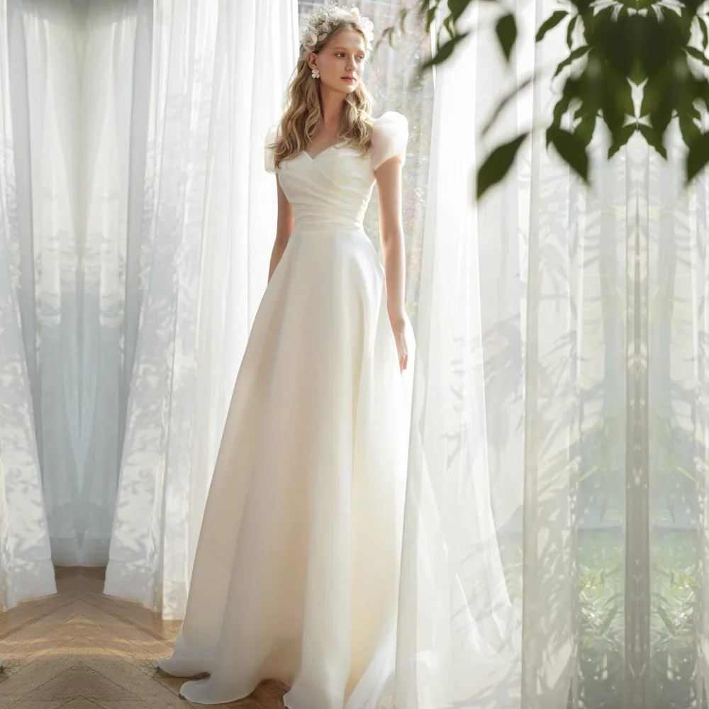 

Платье Свадебное ТРАПЕЦИЕВИДНОЕ со съемным бантом и коротким рукавом