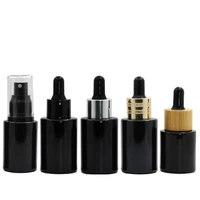 12 x 20ml 30ml 40ml 60ml empty black glass bottle with piepette dropper top lotion essencial oil pump spray pump container