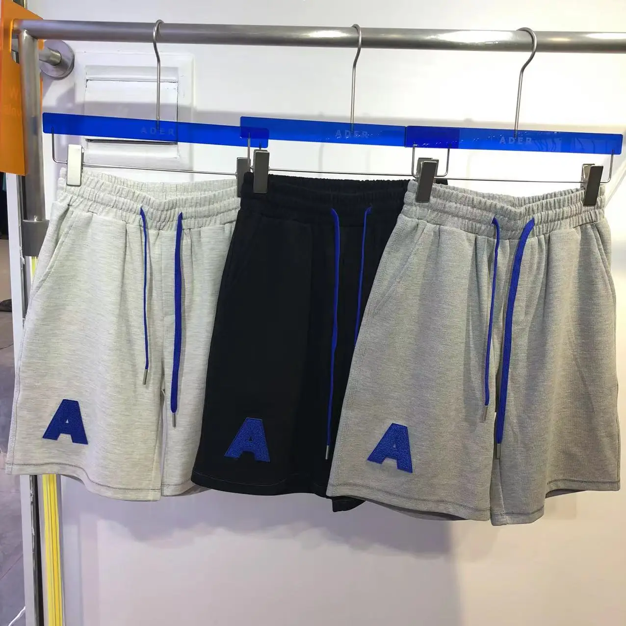 

Ader error 2022 summer high quality 1:1 Korean fashion brand embroidered letters loose Y2K men's and women's casual pants shorts