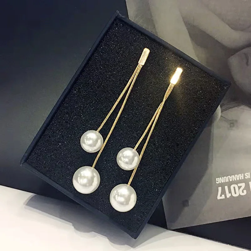 

Japan and Korea New S925 Silver Needle Long Fringed Women's Earrings Symmetrical Creative Simple Pearl Earrings