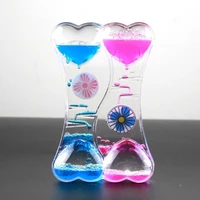 hot sales double heart liquid motion bubble drip oil hourglass timer clock kids toy gift