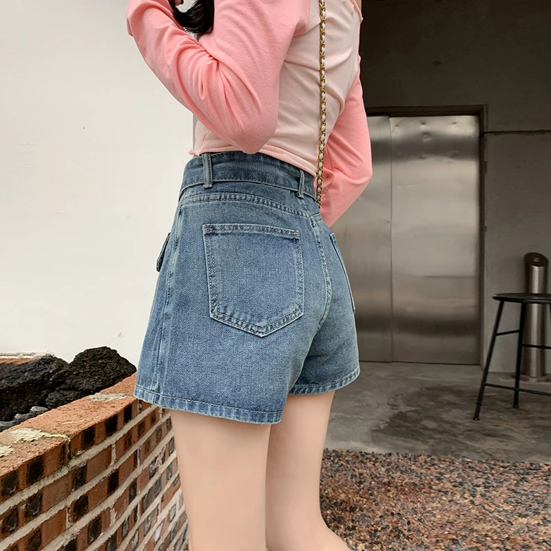 American denim skirt female blue commuting spring/summer 2023 new retro spicy girl design high waisted short skirt pants A-line