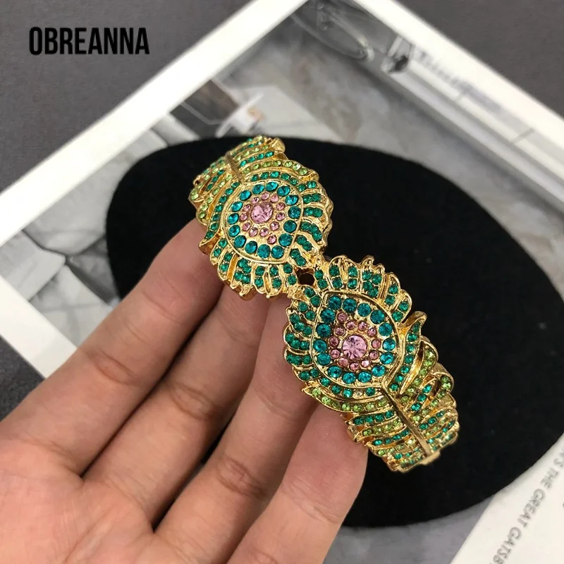 

Французский доступ Lux Гальванизированный настоящий золотой цвет Рейн драгоценный камень открытый пружинный браслет в форме пера подходящий ко всему элегантный браслет Лидер продаж