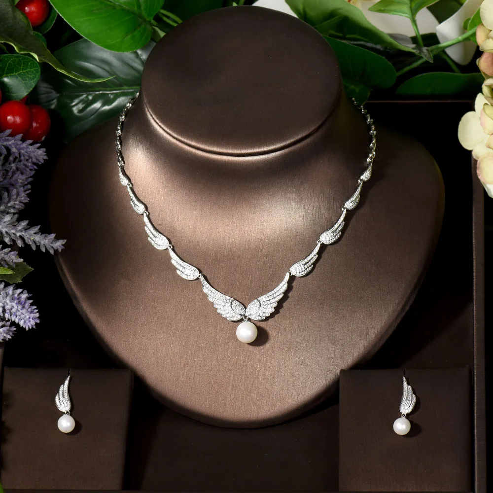 

Женский комплект из колье и серёг, с подвеской в виде крыла ангела