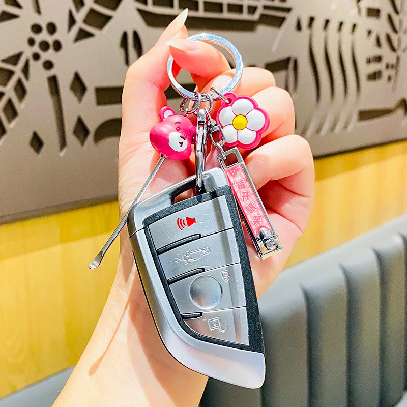 

Креативный медведь, милая ягода, машинка для стрижки ногтей, многофункциональный кулон, брелок для автомобиля, школьный портфель, аксессуар...