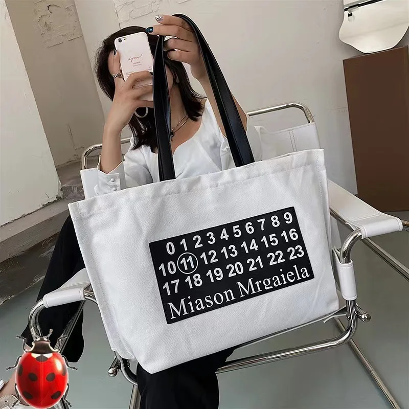 

2023 Pu Leather Label MM6 Margiela Number Print Backpacks Hand Bag Canvas Men Women High-capacity Shoping Tote Bag Zipper Pocket