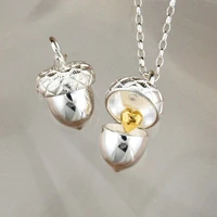 ladies fashion necklace openable two tone pine cone pendant heart shaped pine cone pendant necklace
