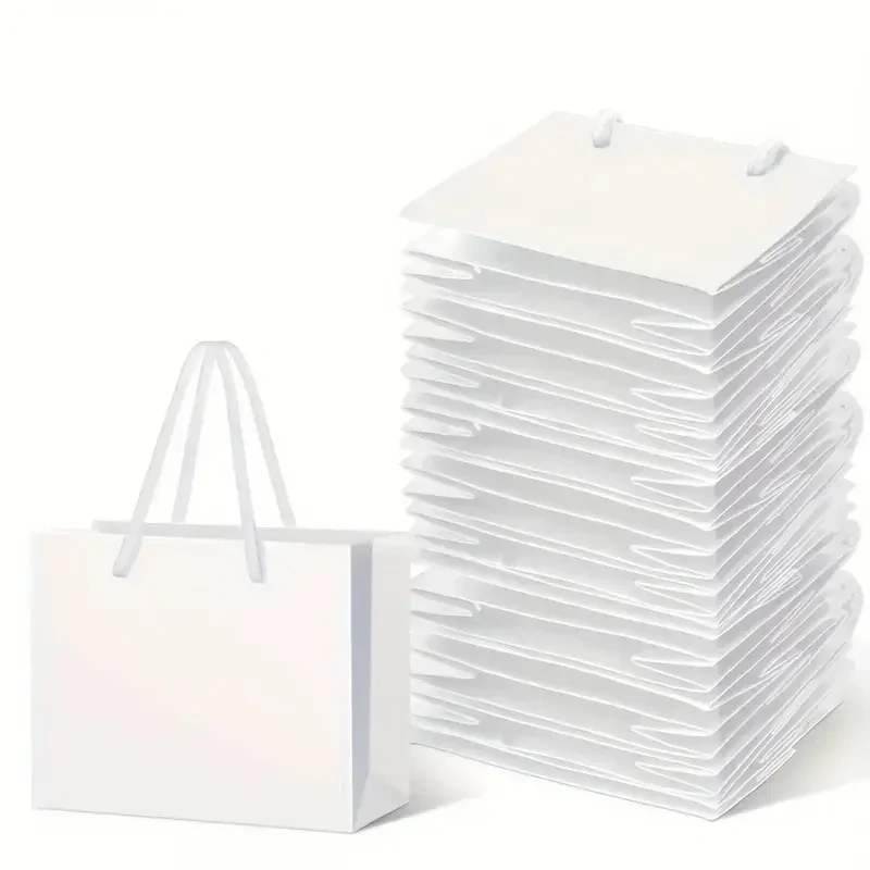 

Подарочные пакеты из картона с веревочными ручками