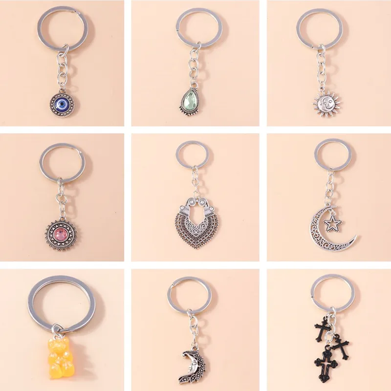 

Cute Love Heart Keychains Ethnic Alloy Moon Sun Charms Keyrings for Women Men Car Key Handbag Pendants Key Chains DIY Gifts
