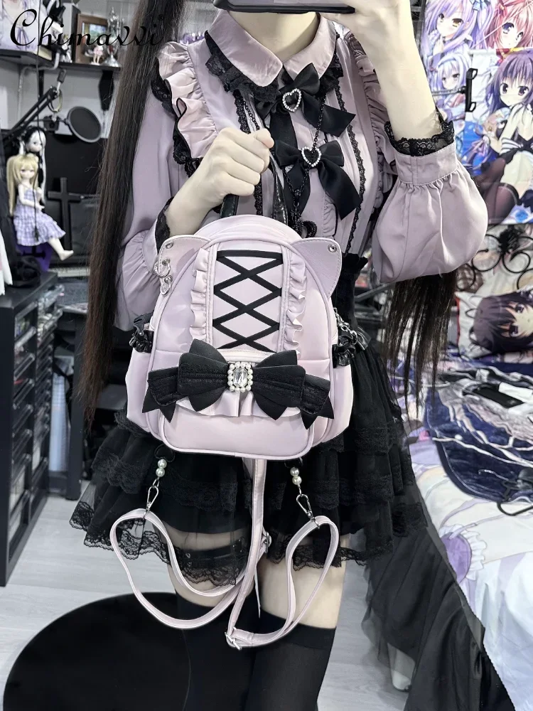 Женский рюкзак на молнии в японском стиле с кружевными вставками и бантом виде