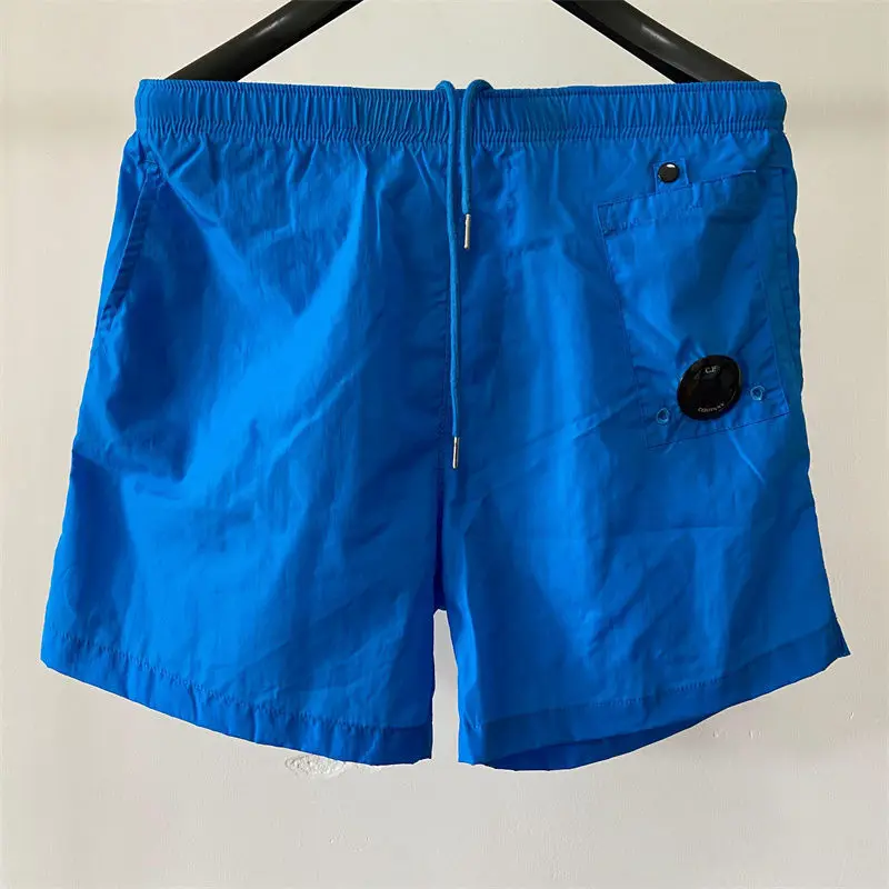 

Summer New CP Mens Shorts Casual Youth Nylon Multi Color Pocket Drawstring Gym Shorts Loose Sports Beach Pants Men Sweatpants
