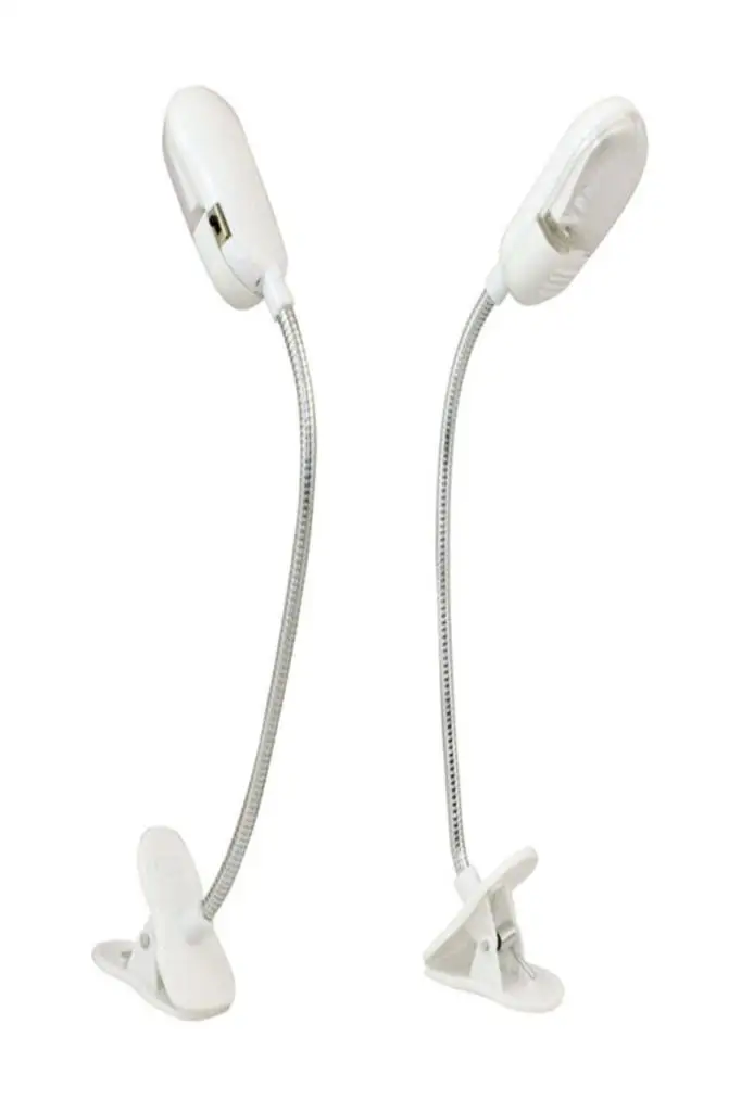 

Led book reading and lighting lamp with latch