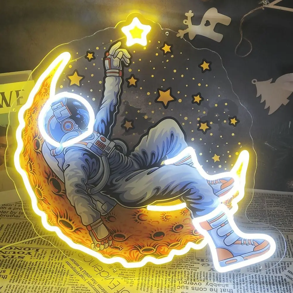 

Неоновая вывеска "Астронавты на Луне"