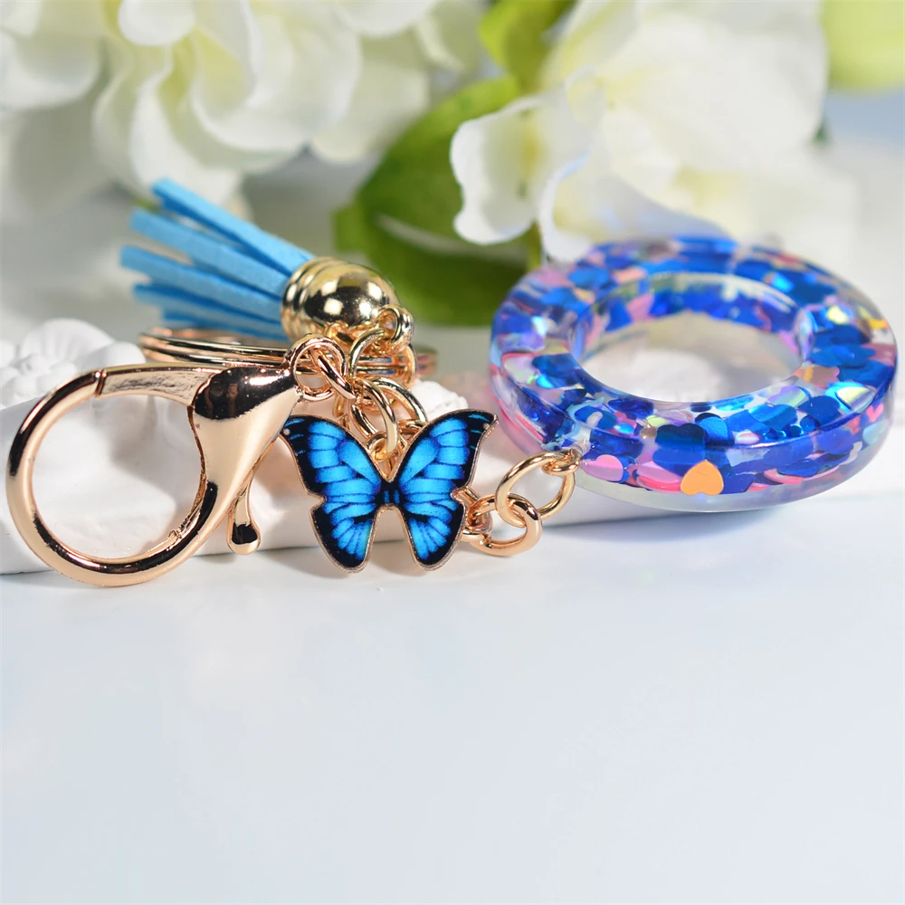 

Модный акриловый брелок с надписью и синей подвеской-бабочкой, в форме сердца, с блестками, с 26 инициалами, брелок для женщин, украшение для с...