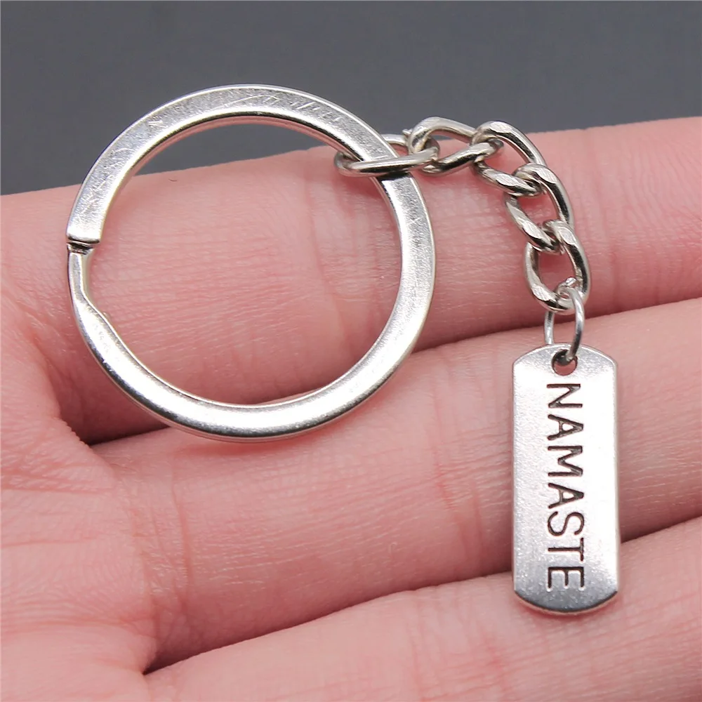

Dropshipping Souvenirs Gift Men Keychain 2 Colors 21x8mm Namaste Pendant Keyring