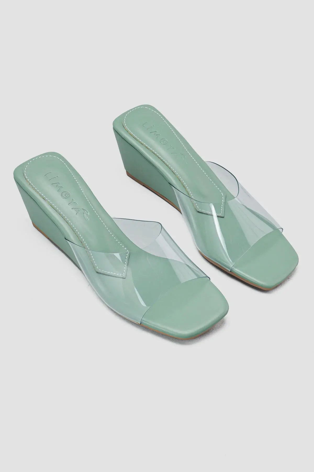 

Aisha Green Transparent Banded Wedges Slippers