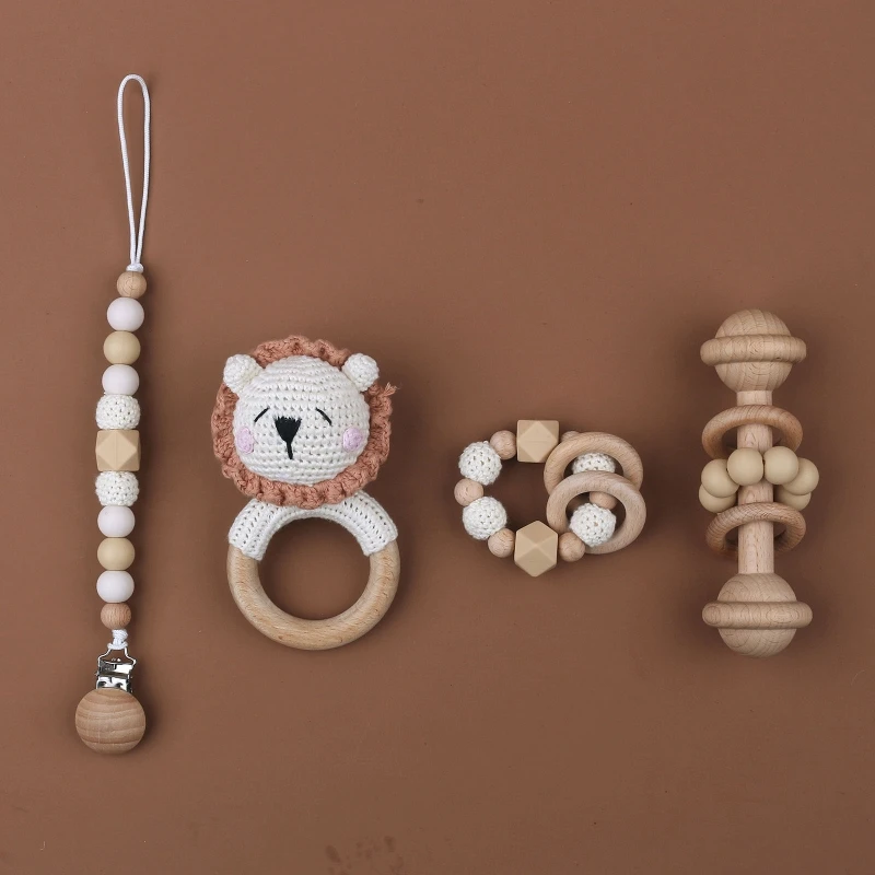 

4pcs/set Wooden Rattle Sets Lion Animal Crochet Rattle Wood Soother Teether Pacifier Chain Clip Montessori Toddler Toy