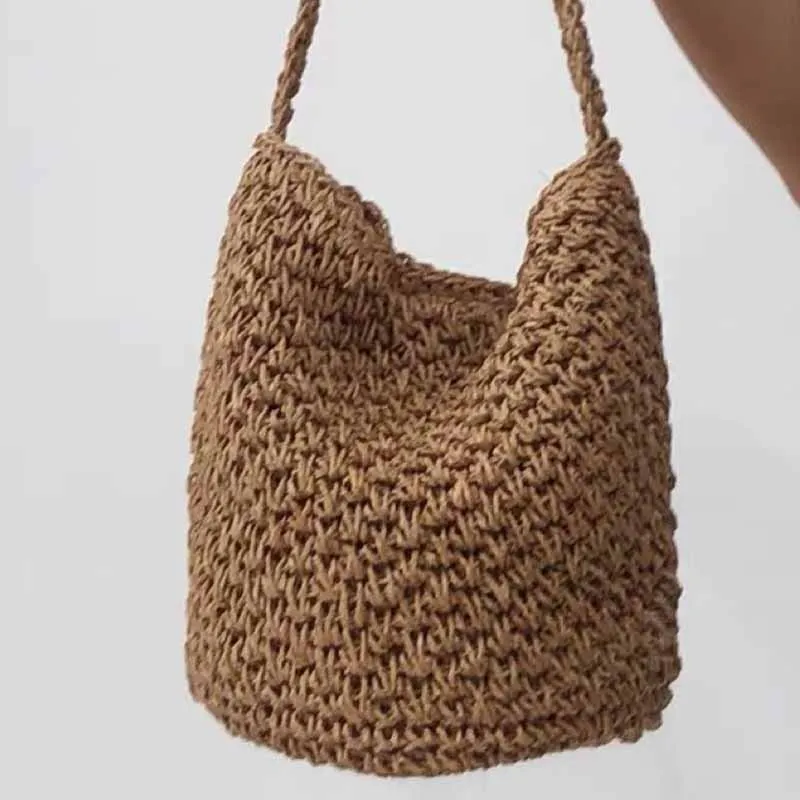 

2022 Hot Selling New Hand-woven Large-capacity Recyclable Straw Hollow One-shoulder Portable Hand-woven Beach Bucket Women's Bag