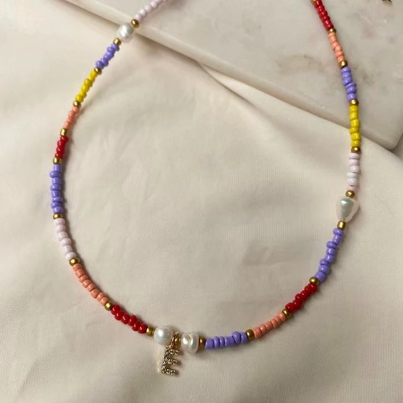 

Zircon Alphabet Necklaces Ladies Fashion Jewelry Colorful Rice Beads Custom Jewelry Charm Natural Freshwater Pearls