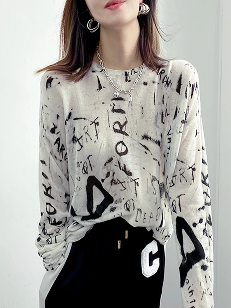 

Женская футболка с длинным рукавом, круглым вырезом и принтом