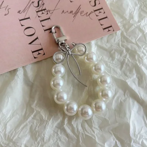 Подвеска с бантом и жемчугом