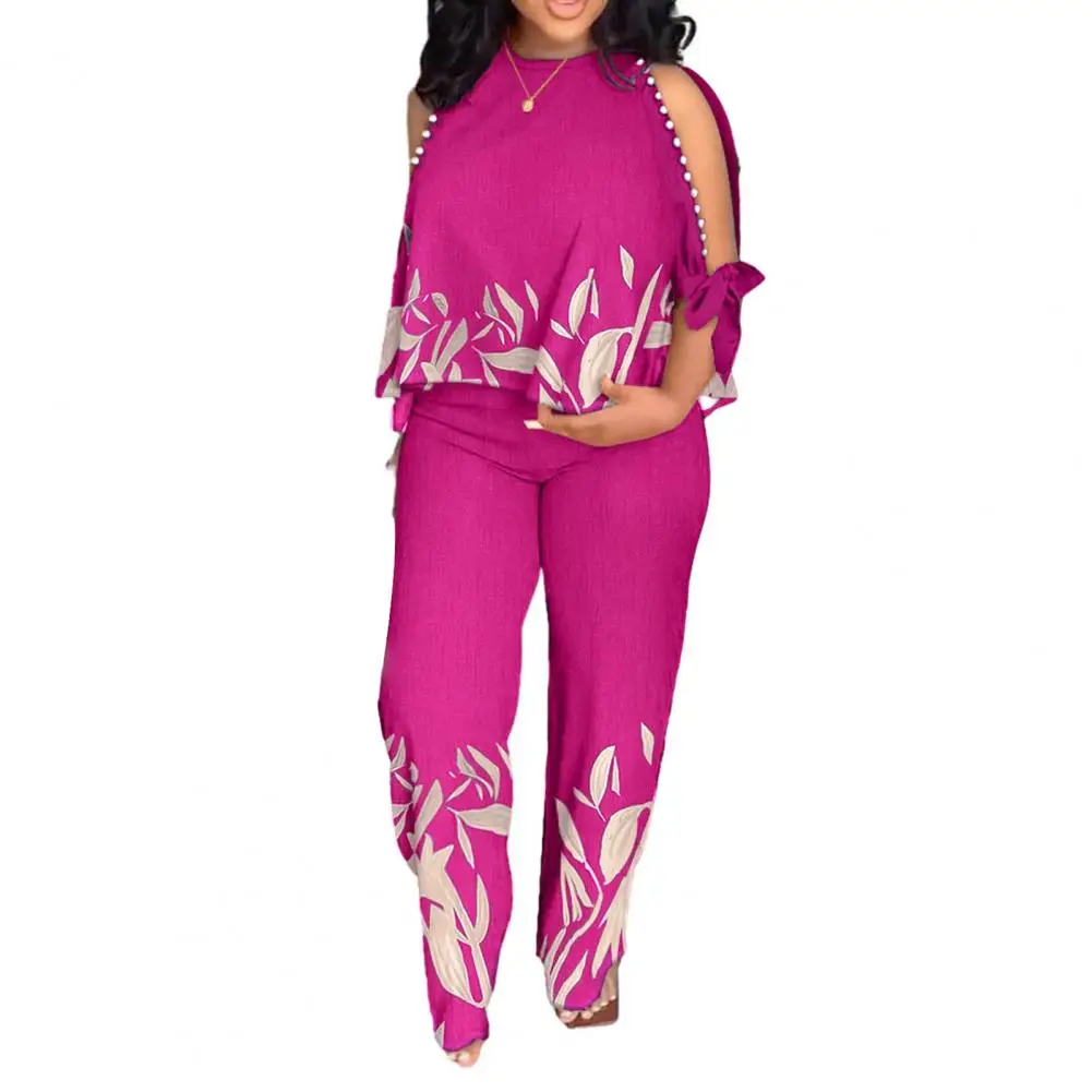 

Женский офисный комплект из двух предметов, футболка с рукавом до локтя и открытыми плечами, штаны с высокой талией и принтом, лето 2023