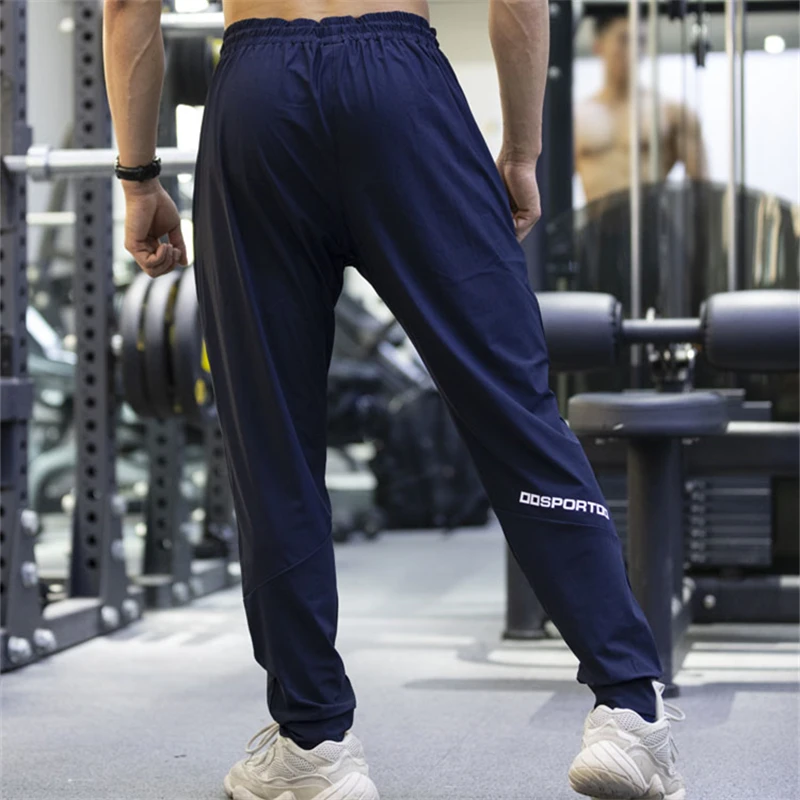 Купи 2023 Men's Running Sports Long Pants Leisure Breathable Quick Dry Jogging Sweatpants Man Casual Outdoor Sport Elastic Trousers за 1,073 рублей в магазине AliExpress