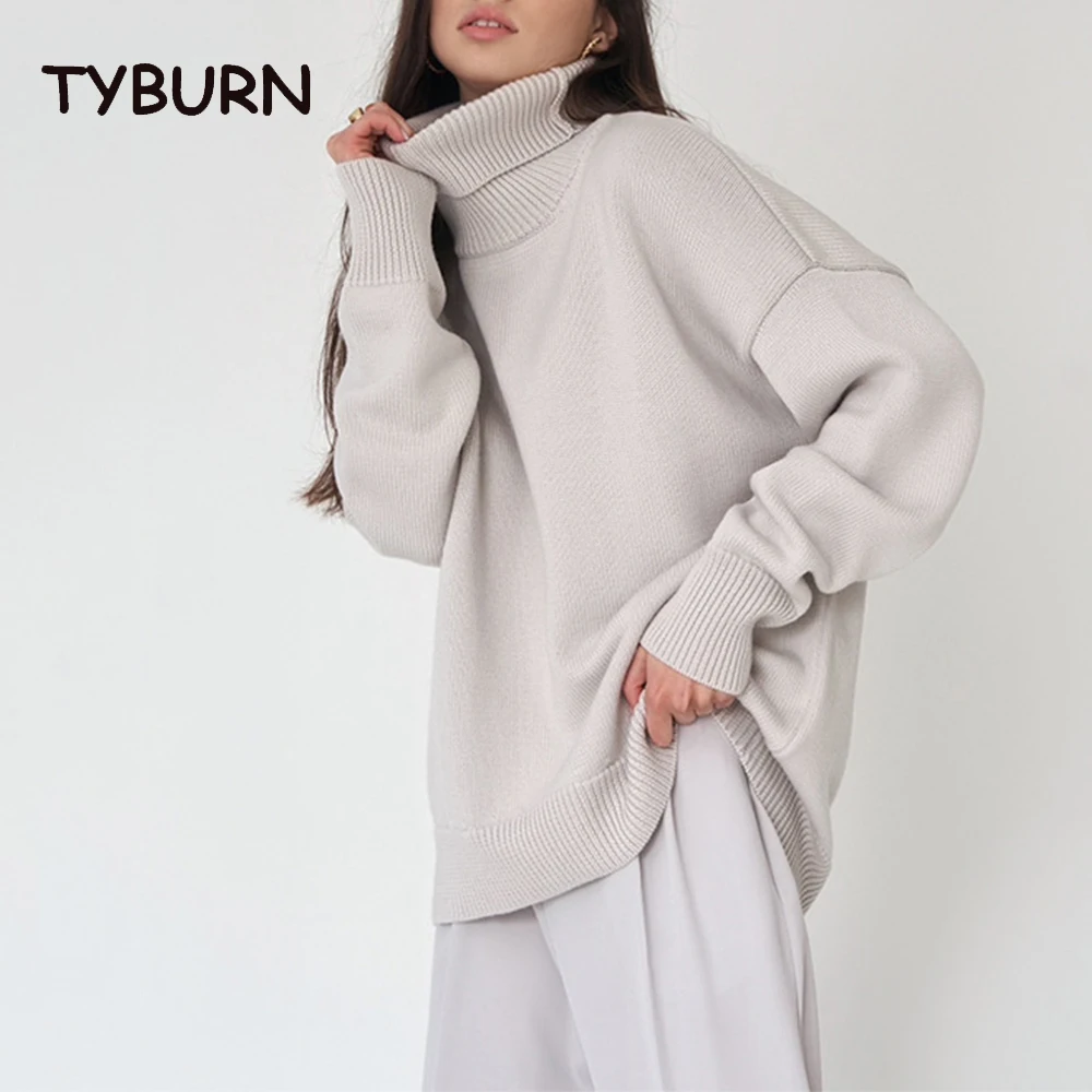 

Женский трикотажный свитер-водолазка в стиле ретро