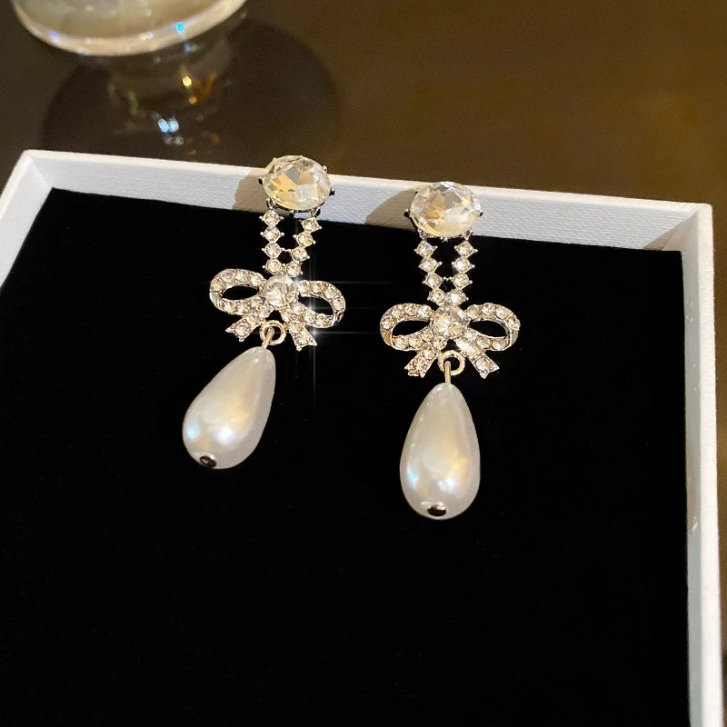 

Lovely Silver Bowknot Pearl Drop Earrings for Women French Zircon Exquisite Long Earrings Jewelry Gift New