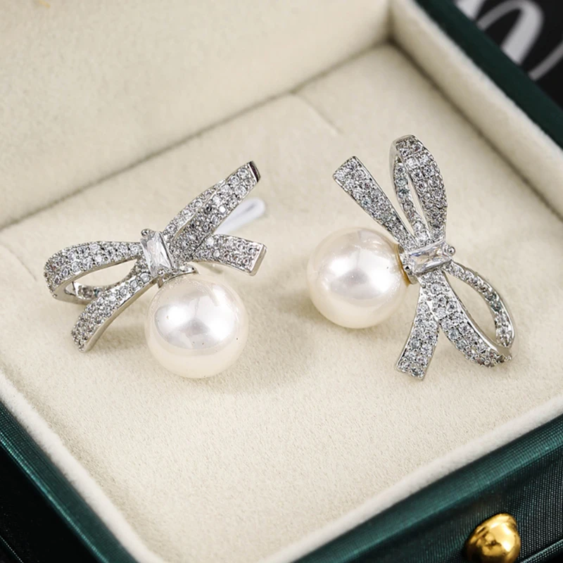 

Cute Bow Pearl Earrings Luxury Cubic Zirconia Shiny Women White Gold Jewelry Shopping Anniversary Jewelry Wear Free Shipping