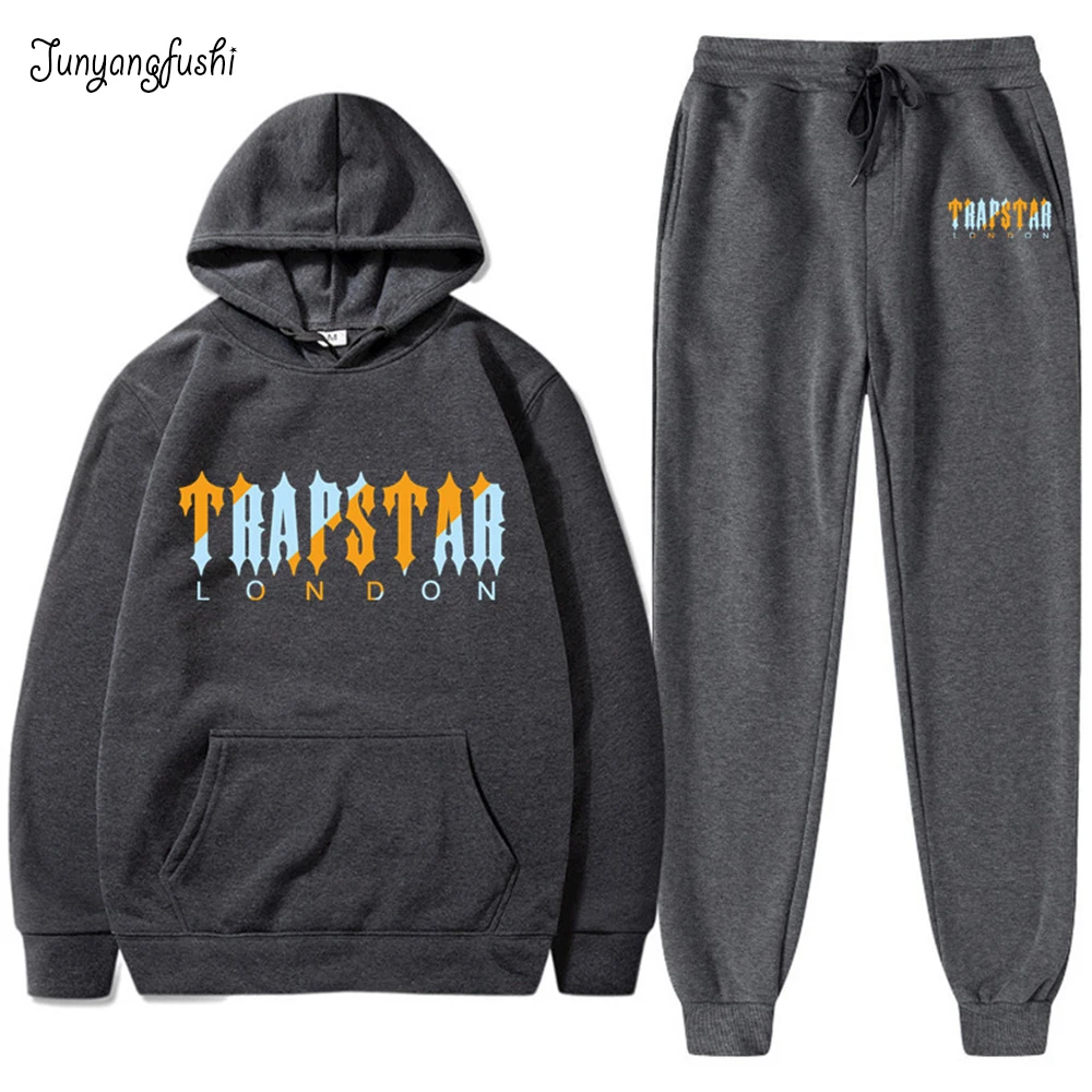 Men's and women's printed loose sportswear, a two-piece set consisting of hooded sweatshirt and trousers, and a pair of sportswe