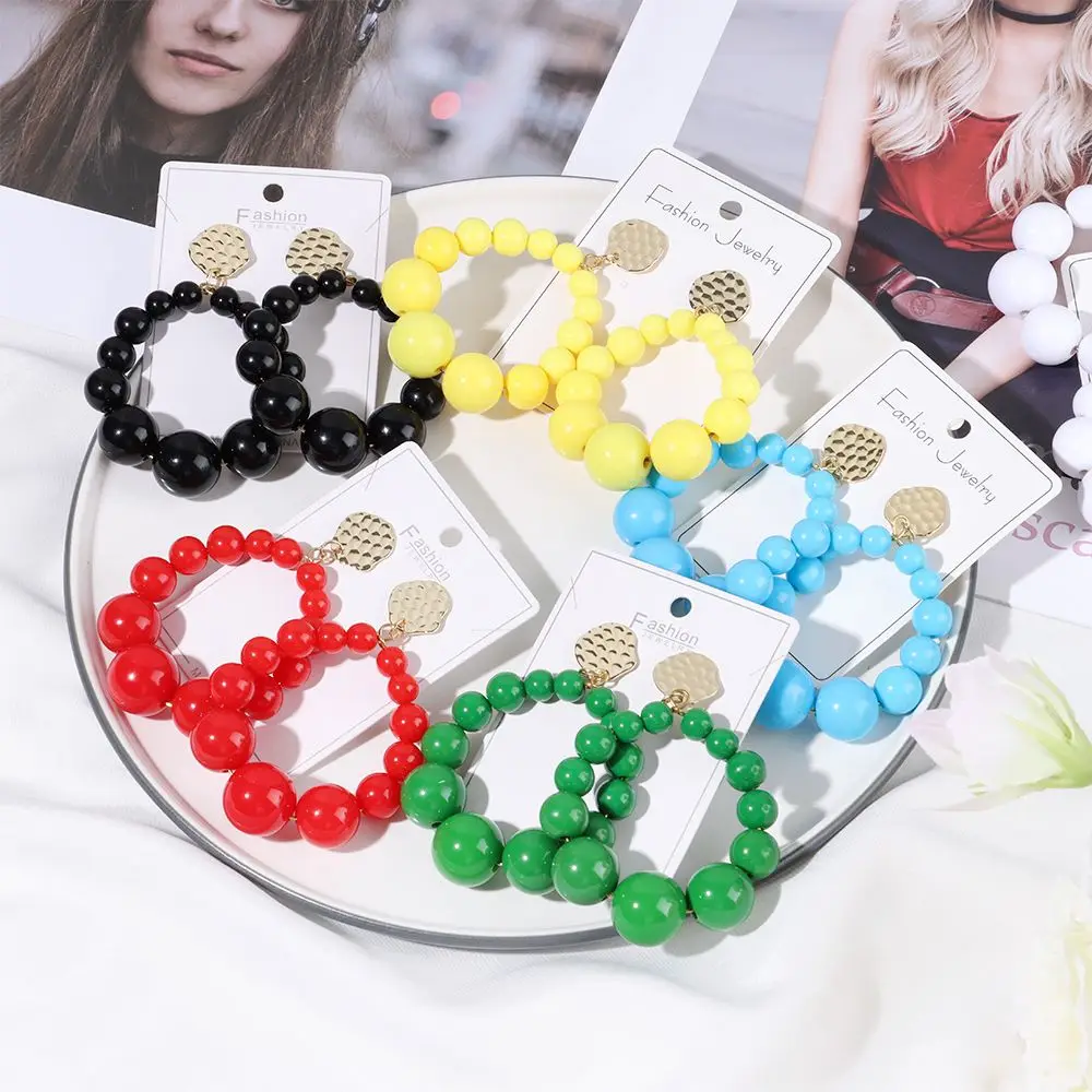 

Bohemian Color Bead Hyperbol Earrings For Women 2021 Trend Gradual Acrylic Vintage Hanging Earrings Fashion Female Party Jewelry