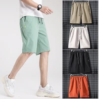 youth trend shorts mens five point pants solid color casual pants 2022 summer sports beach pants shorts for men