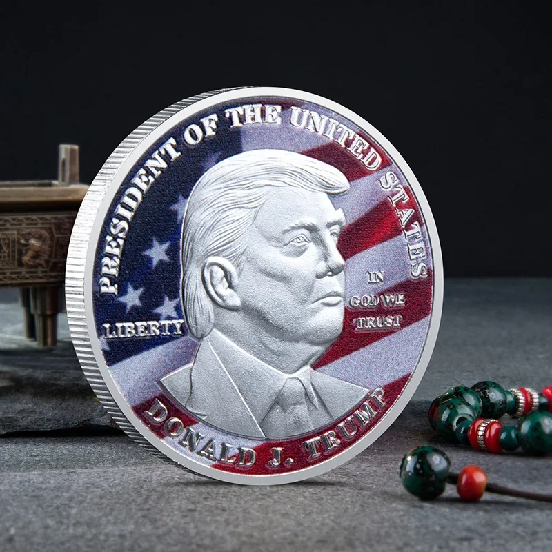 

Золотая монета Дональда Трампа