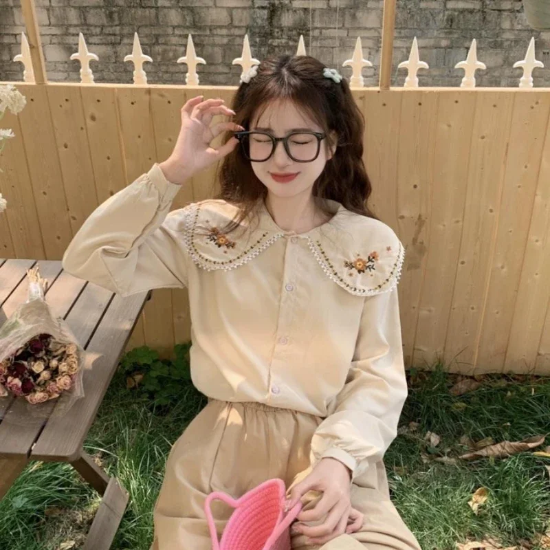 Женские рубашки с длинными рукавами и вышивкой уменьшающие возраст повседневные