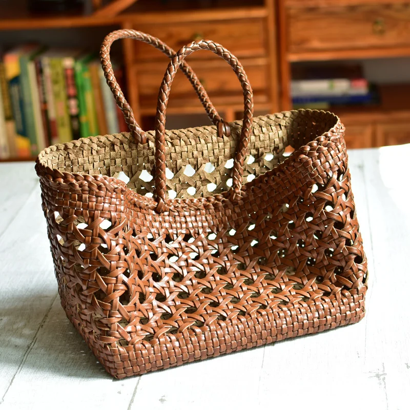

Braided cowhide hollowed-out vegetable basket bag