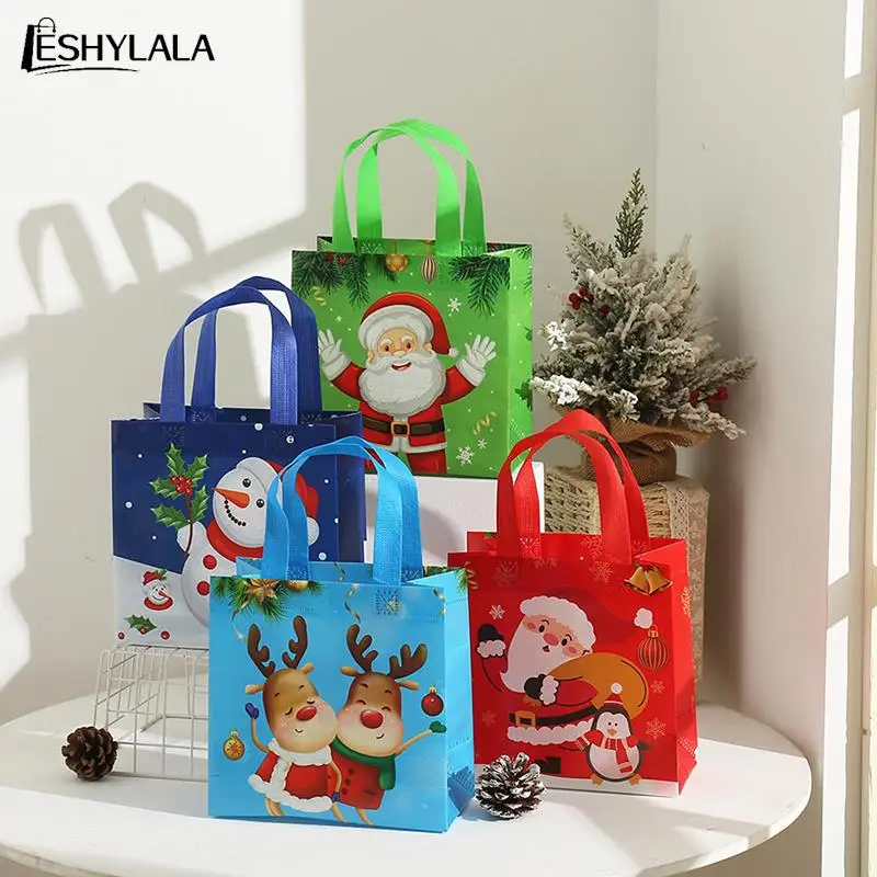 

4pcs Christmas Candy Bag Waterproof New Christmas Non-woven Fabric Tote Bags Candy Gift Packaging Santa Claus Kids Gift Bag