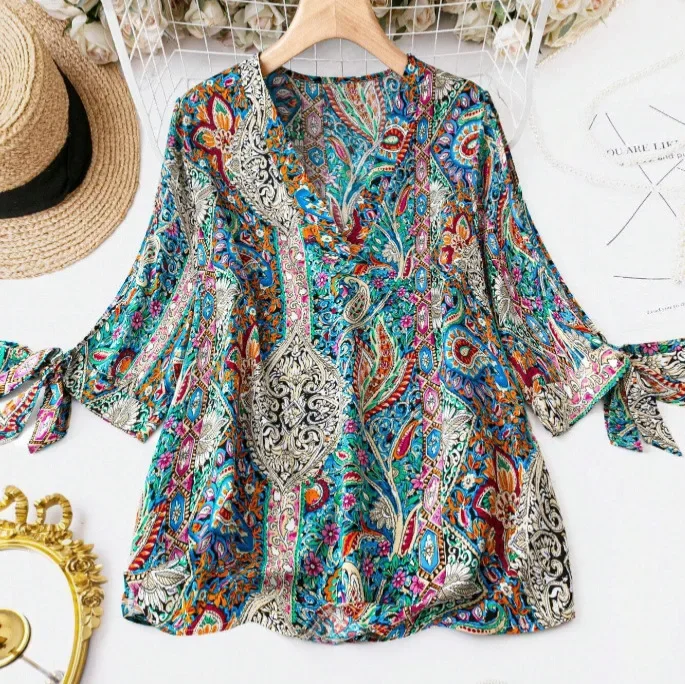 Женский пуловер с V-образным вырезом свободного покроя