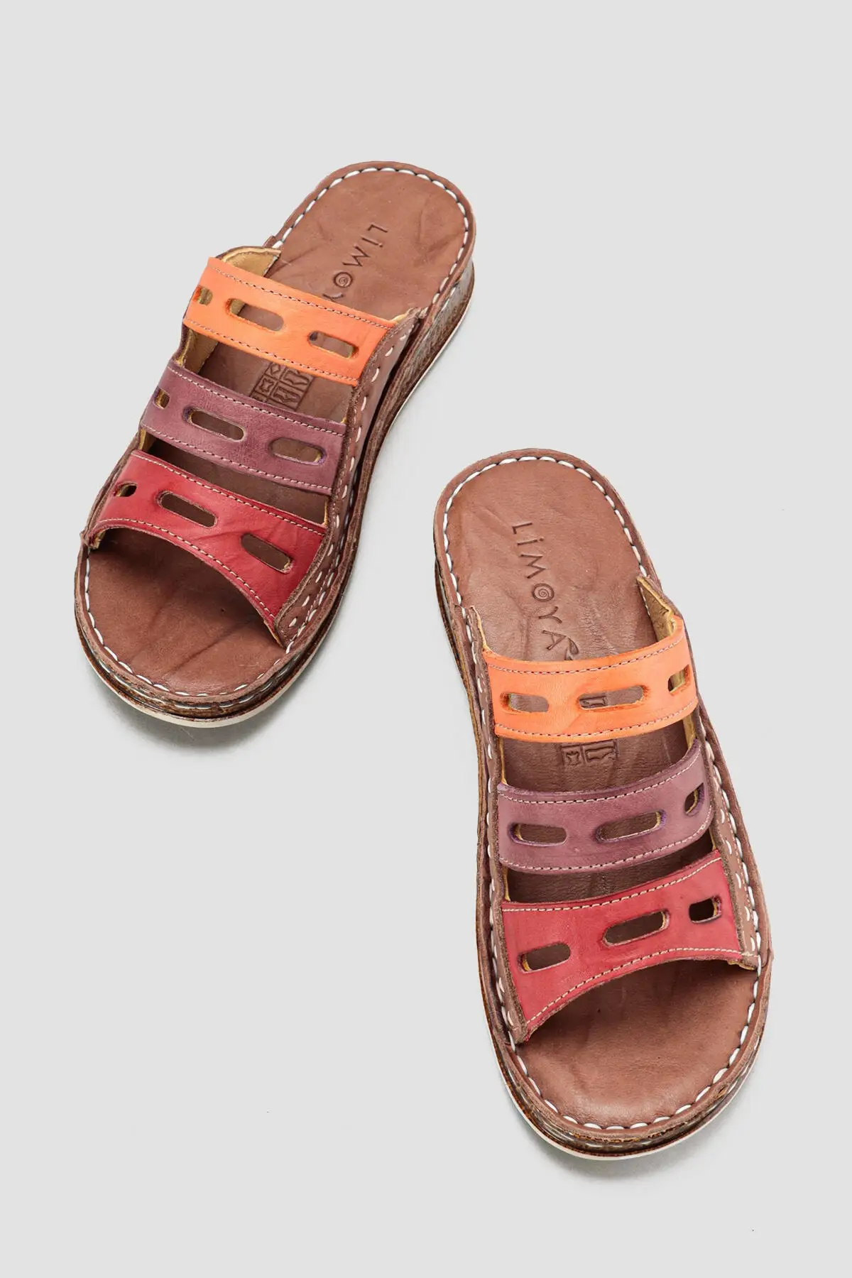 

Genuine Leather Katrina Earth Comfort Laser Cut Slippers