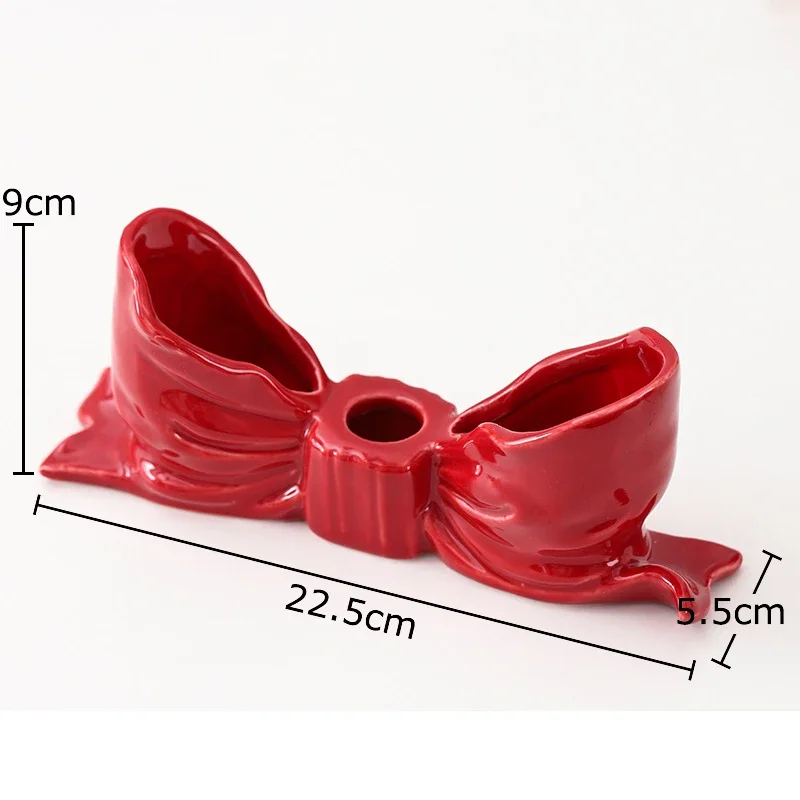 

Керамические подсвечники в форме банта