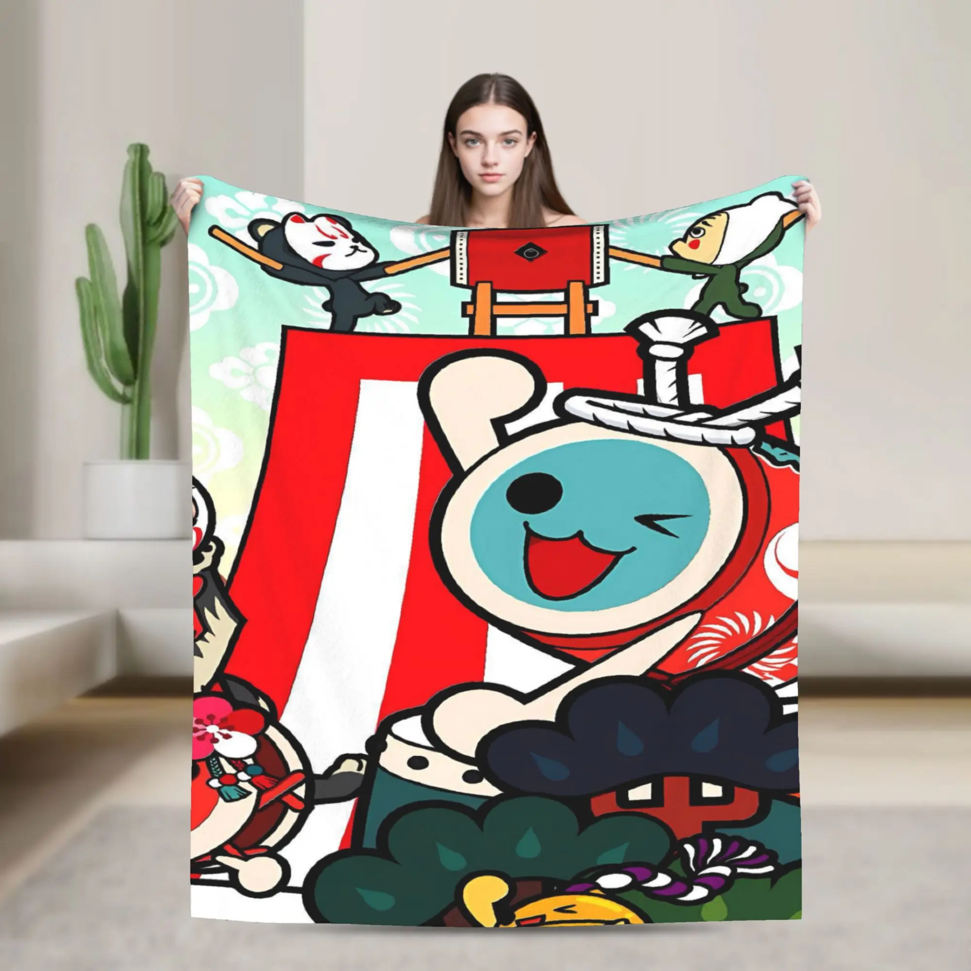 Фото Плед Taiko no Tatsujin: качественный, теплый, мягкий плед для зимы, декоративный элемент интерьера, эстетичное покрывало для дома.