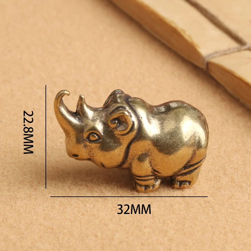 

Латунная статуэтка носорога