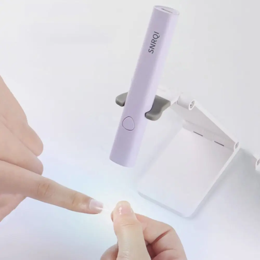 

Ультрафиолетовая светодиодная мини-лампа для ногтей быстросохнущая пластиковая ручная Сушилка для ногтей с держателем перезаряжаемая лампа с одним пальцем для девушек