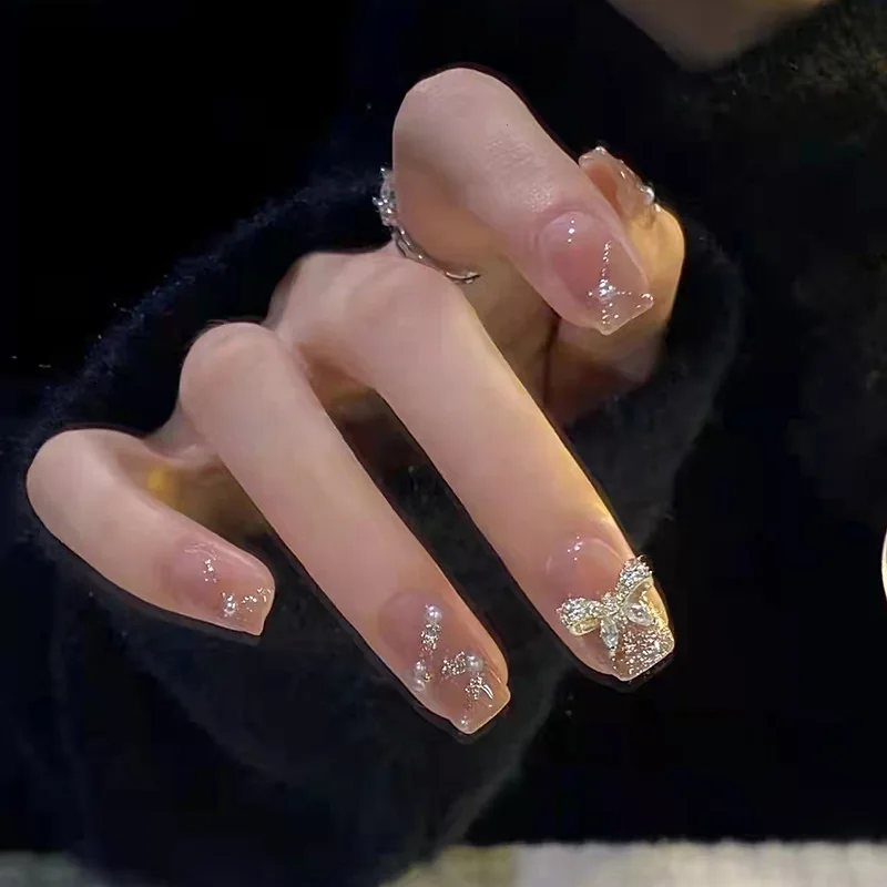 

Wearing Nail Patches Finished Fake Nails Girls Wearing Nail Enhancements Pink and Cute Detachable Nail Patches