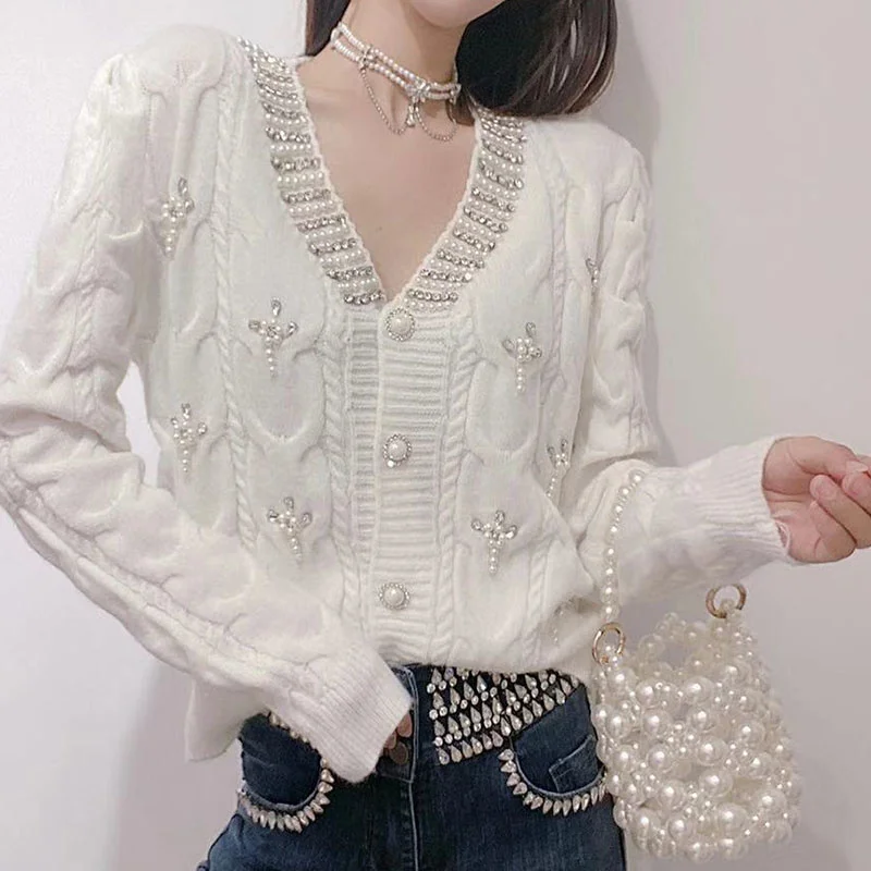 

Design sense heavy engineering nail drill beaded v-neck wool sweater women's 2021 autumn clothes lazy wind thick fried dough