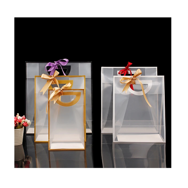 

PVC Handle Gift Plastic Bag With Clear Frosted Luxury Shopping Bow Packaging