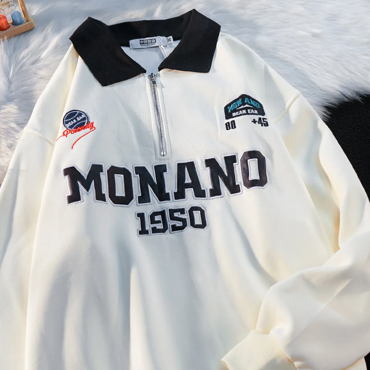 

Пуловер женский оверсайз на молнии с воротником-поло