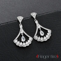 stylish and beautiful scalloped gorgeous diamond earrings luxury engagement dinner accessories