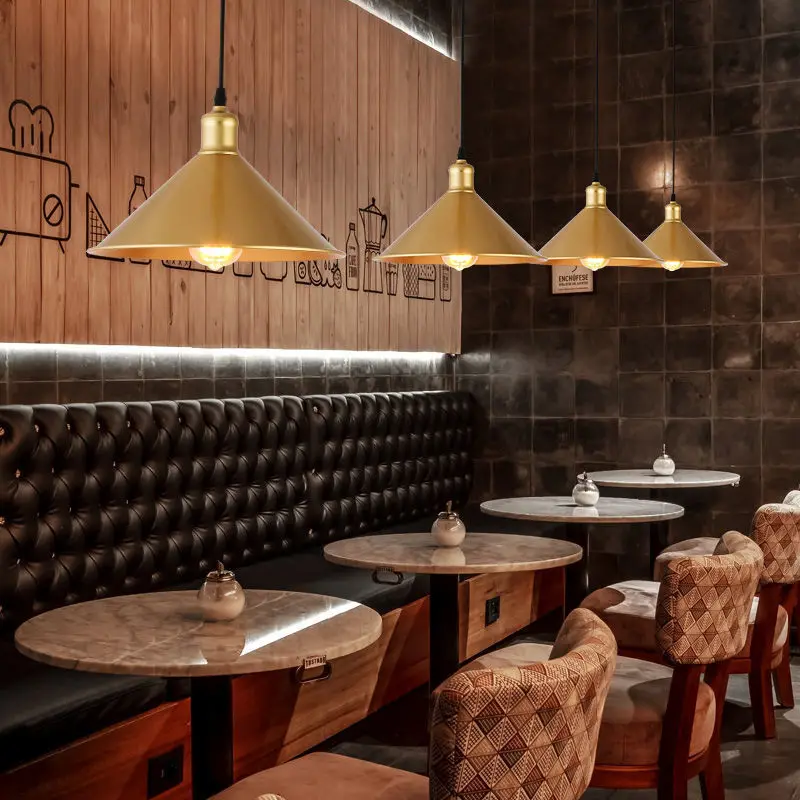 

Northern European restaurant chandelier single head dining chandelier creative character retro study lighting simple modern gold